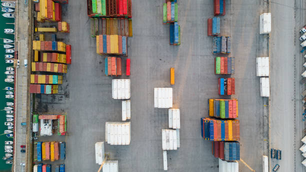 istock Aerial image of logistics platform with containers to import and export materials by ship 1453738119
