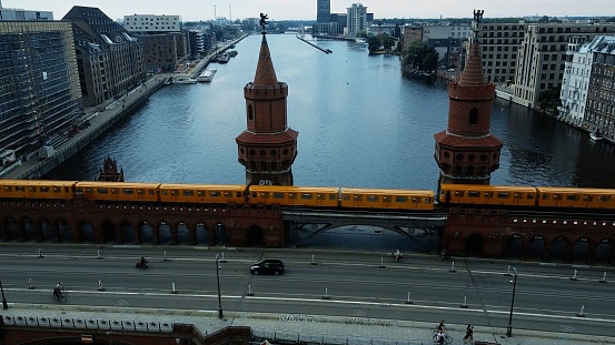 Aerial view of the Oberbaumbrucke bridge over a lake in Berlin, Germany