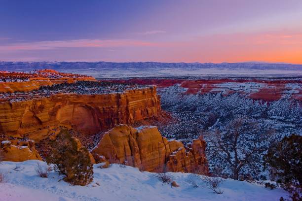 istock Scenic view of a dry desert filled with cliffs during an orange sunset 1453740441