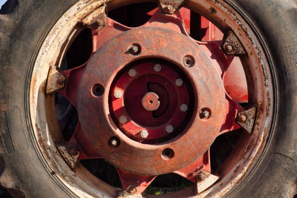 A closeup side view of the old tractor trailer's tires