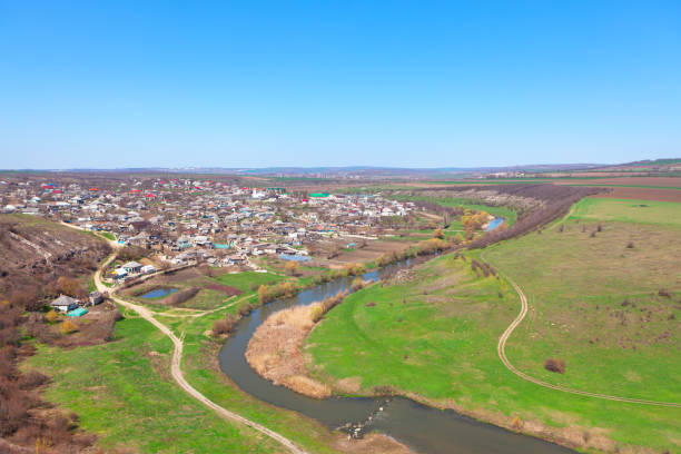 istock Village situated at the river coast 1453743344