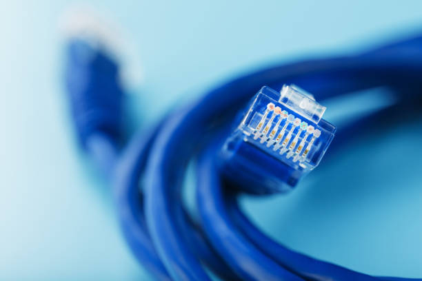 istock A coil of an Internet network cable for data transmission on a blue background 1453748297