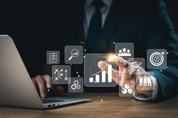 istock concept of long-term business development and management Executives looking at virtual screens business graph icon Goal setting, problem-solving, workflows, optimal business operations and innovation. 1453749005