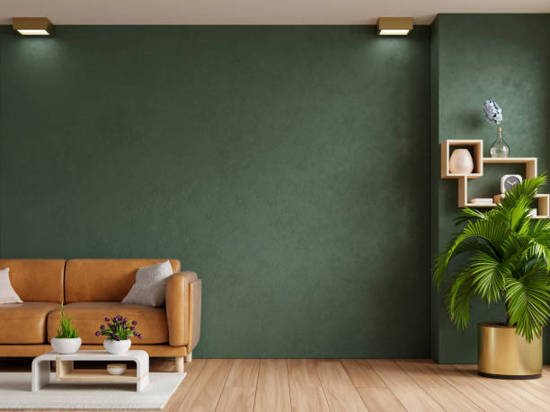 istock Living room with leather sofa and accessories on empty dark green wall background. 1453752191