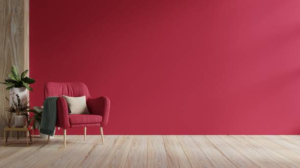 viva magenta wall background mockup with armchair furniture and decor. - empty room 個照片及圖片檔