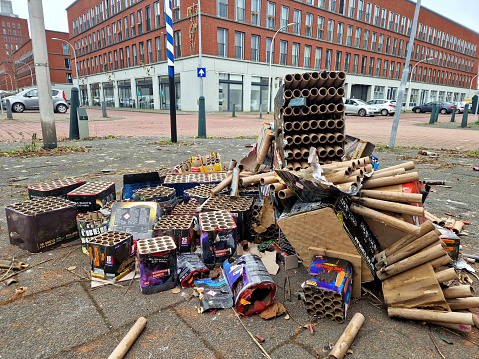 Empty firework boxes on the street after a display