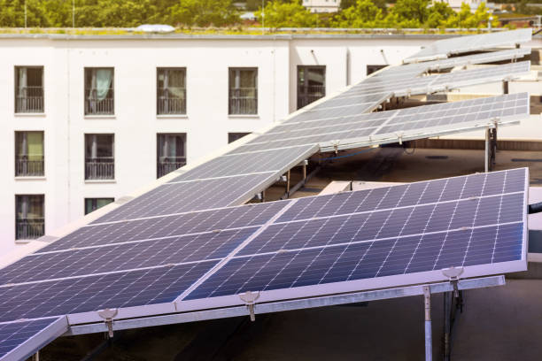 istock Solar Panels on Roof Apartment Building 1453756852