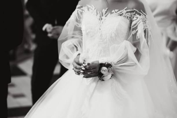 istock Priest during a wedding ceremony - nuptial mass. 1453763761