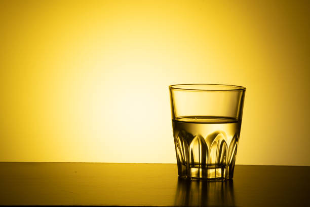 Half glass of water on the table