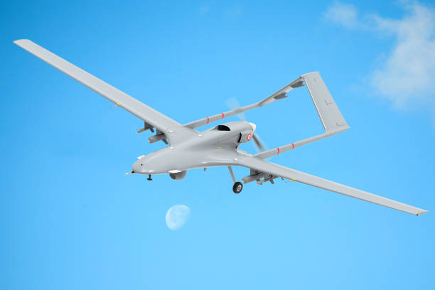 istock Bayraktar TB2 unmanned aerial vehicle gliding through the clouds. 1453766397