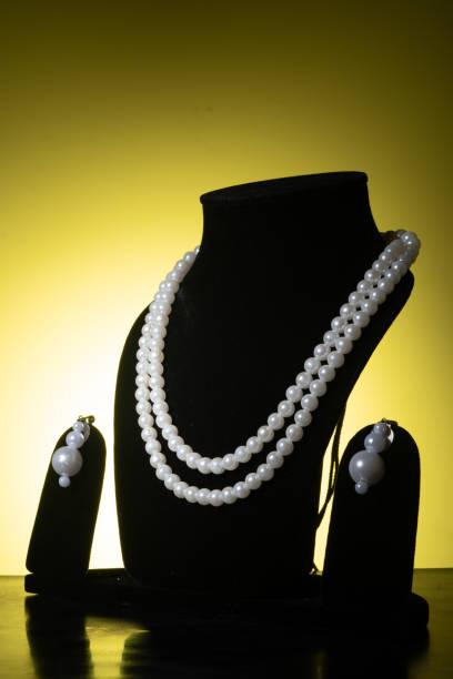 istock semi precious stone necklace, white pearl necklace 1453768338