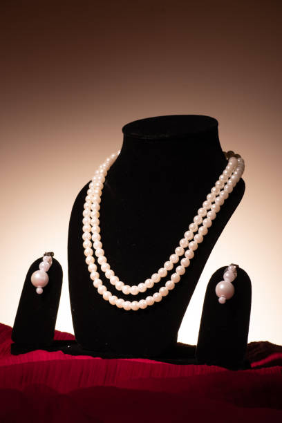 istock White pearl necklace on mannequin 1453768355