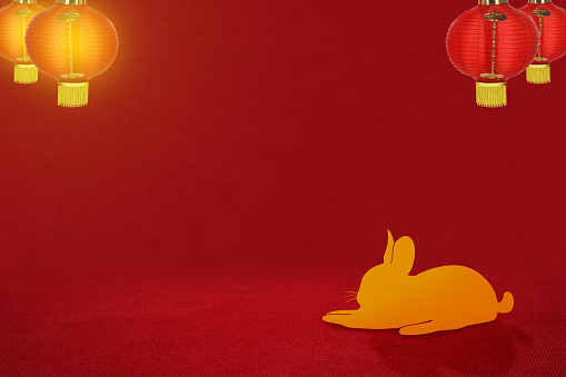 Rabbit with a hanging lantern on a colored background. Happy Chinese New Year. Chinese New Year of Rabbit