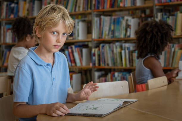 istock Preschoolers in the library 1453778114