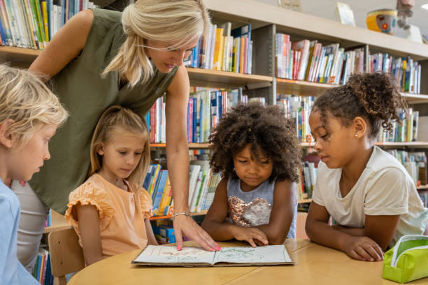 istock Preschoolers in the library 1453778176