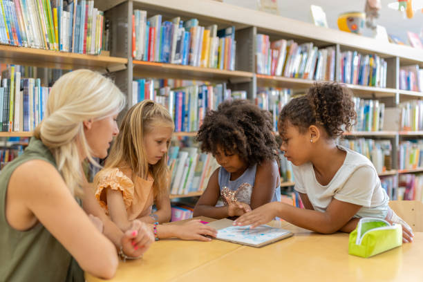 istock Preschoolers in the library 1453778182