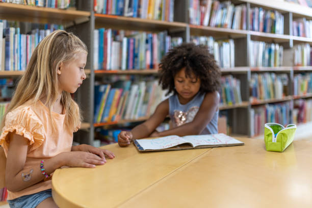 istock Preschoolers in the library 1453778186