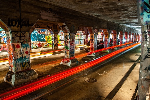 Atlanta, United States – September 01, 2016: A graffiti tunnel with long exposure of lights in Atlanta near cabbage town