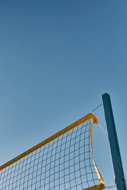 istock Beautiful view of a volleyball net with blue sky background 1453779519