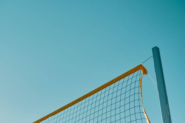 istock Beautiful view of a volleyball net with blue sky background 1453779520