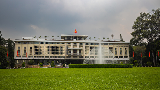 Ho Chi Minh City, Vietnam - November 07, 2022: Independence palace at Saigon with water fountain. Also known as Reunification Convention Hall, workplace of the President of the Republic Vietnam.