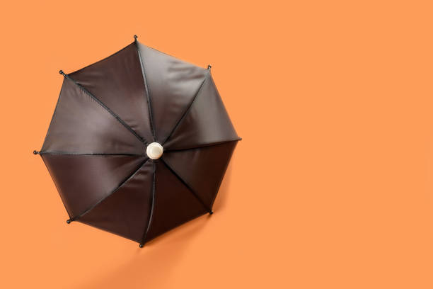 Open umbrella for shelter from the rain. Spring and autumn weather. Protection and shelter from bad weather and snow.