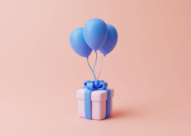 istock Gift box and balloons on pastel pink background 1453786592
