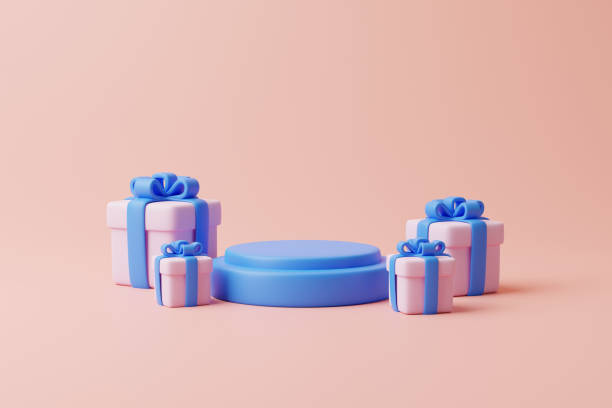 istock Podium and gift boxes on pastel pink background 1453786639