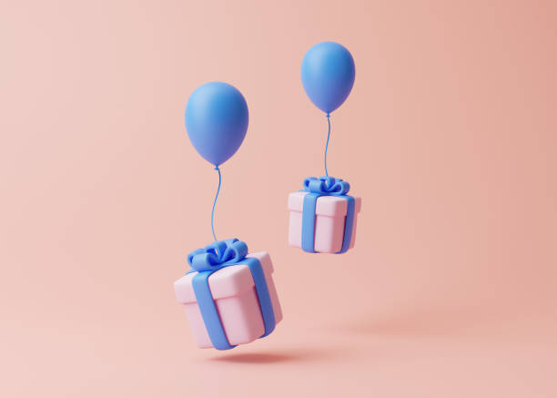 istock Gift boxes and balloons on pastel pink background 1453786656
