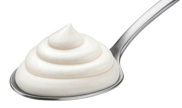 istock Mayonnaise in spoon isolated on white background, full depth of field 1453788224
