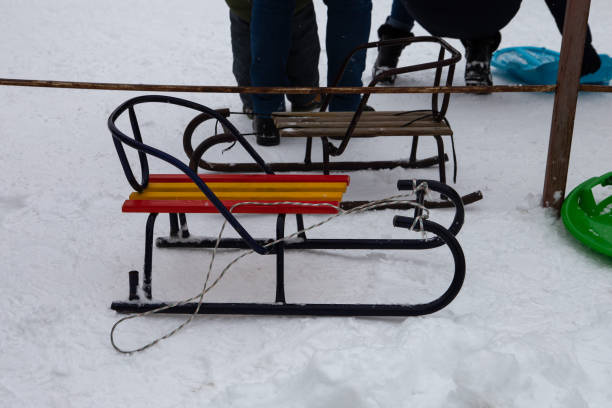 istock Children's sledges in the snow. 1453788324