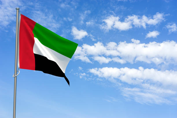 istock United Arab Emirates Flag Over Blue Sky Background. 3D Illustration 1453792985
