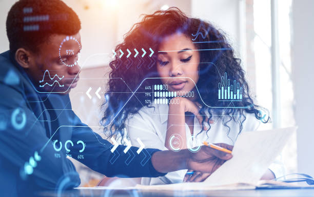 istock African business people studying in office room, big data graph 1453794552
