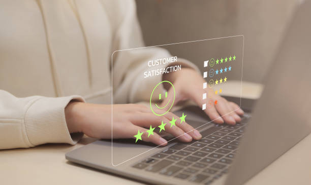 istock Client give five star rating to service experience on computer app. Customers opinion evaluate the quality of services to reputation and business success. Customer review satisfaction survey concept. 1453797751