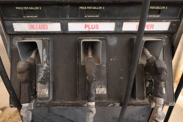 istock Gasoline pump handles at an abandoned station in Texas 1453798983