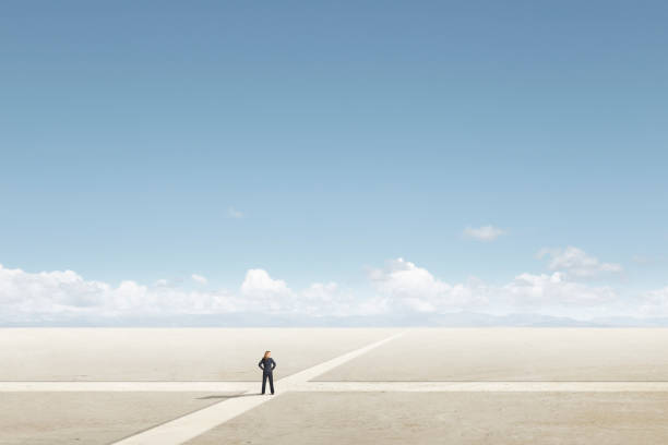 istock Woman Standing At A Crossroad 1453799532