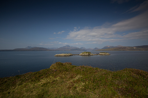Cuillin Mountains form Toskavaig, Isle of Skye, Scotland on a sunny summers day