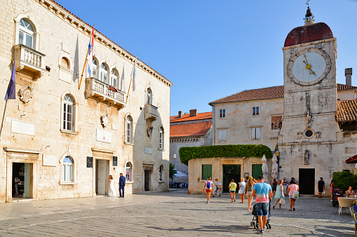 Trogir, Croatia – April 22, 2021: A view of old buildings in Trogir, a medieval Croatian town