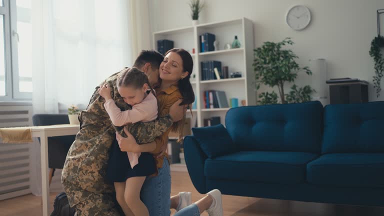 Dad in the military coming back home to wife and daughter, family reunion