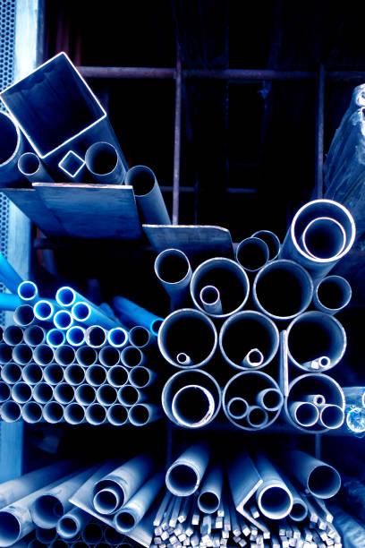 istock Various shape profiles and tubes on warehouse shelf 1453805251