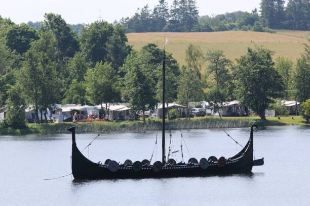 istock Viking ship on Faarup Lake in Denmark. 1453805564
