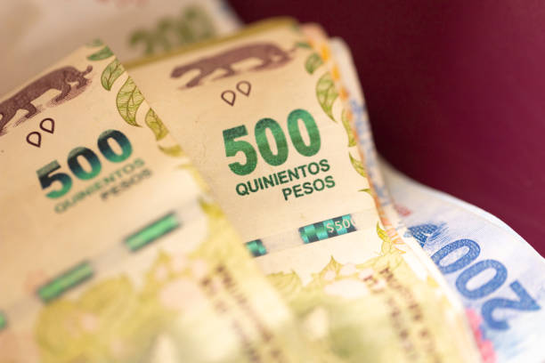 istock Argentine peso banknotes in close-up photo. 1453807497