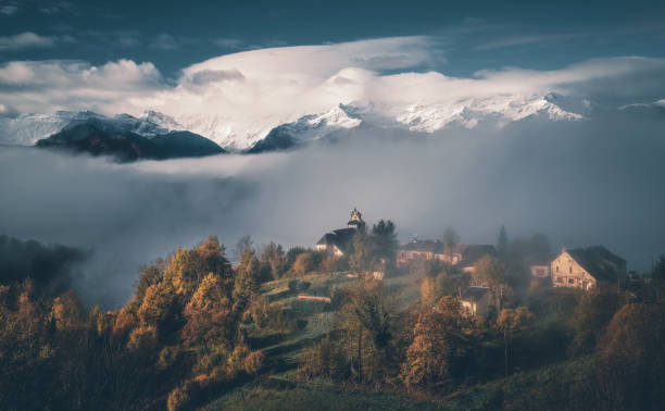 Free Stock Photo of Snowy church and mountain in a small village ...
