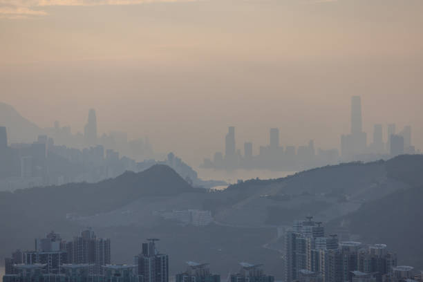 The silhouette of harbour city skyline with surrounding hills