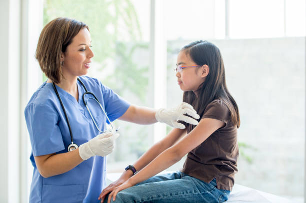 istock Girl Receiving a Vaccination 1453819700
