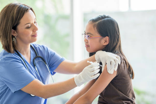 istock Girl Receiving a Vaccination 1453819706