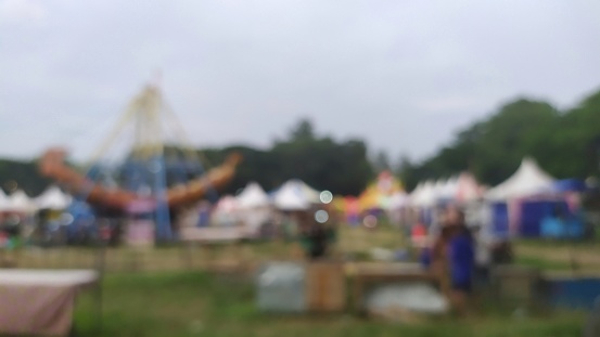 defocused photo of the fair taken in the afternoon