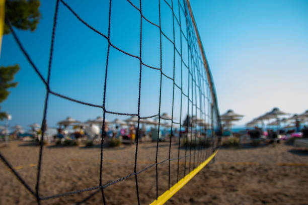 istock A beach volleyball net on the beach with a clear and sunny sky 1453819948