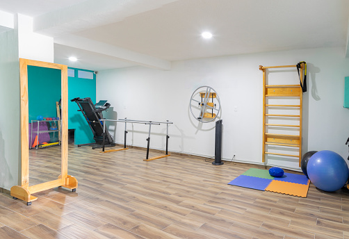 Latino physiotherapy clinic, with handrails, stairs and physical rehabilitation equipment