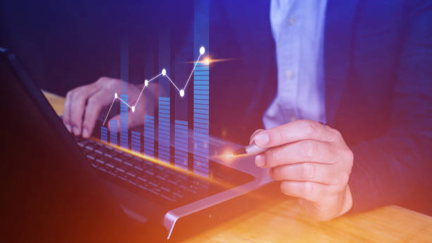 istock Businessman stylus pen touch points symbol stock graph and chart background, concept growth and development business investment, Stock market and strategy making market plan and stock market fluctuations 1453821573